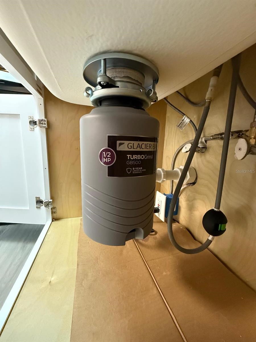 Brand new disposal for easy clean up.