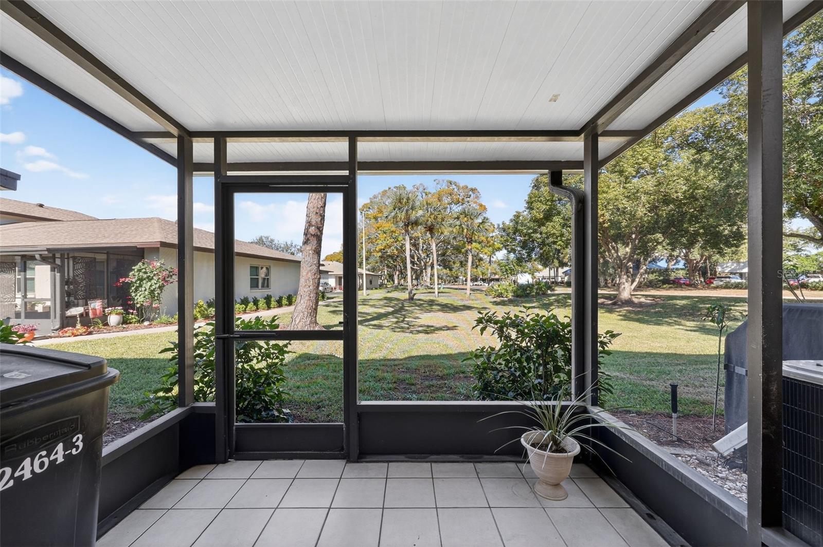 Screened Covered Patio Photo Out over Yard