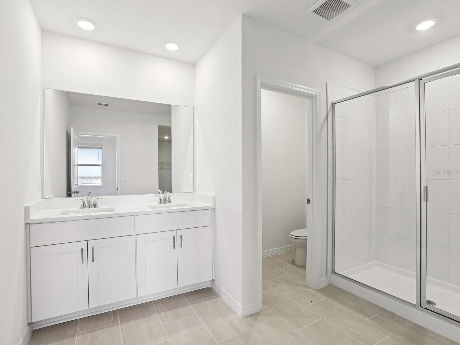 Interior photos are not of the actual home but are photos of the builder home with same floorplan with similar interior finishes and features.