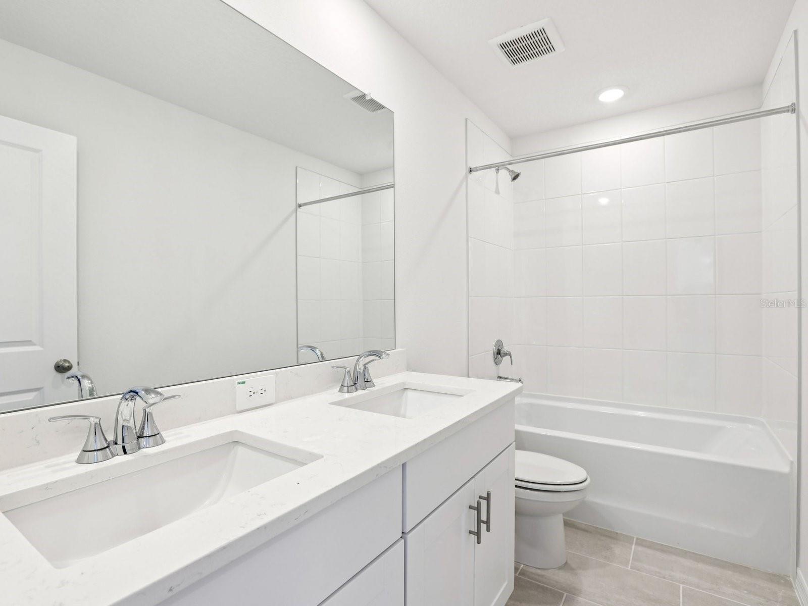 Interior photos are not of the actual home but are photos of the builder home with same floorplan with similar interior finishes and features.