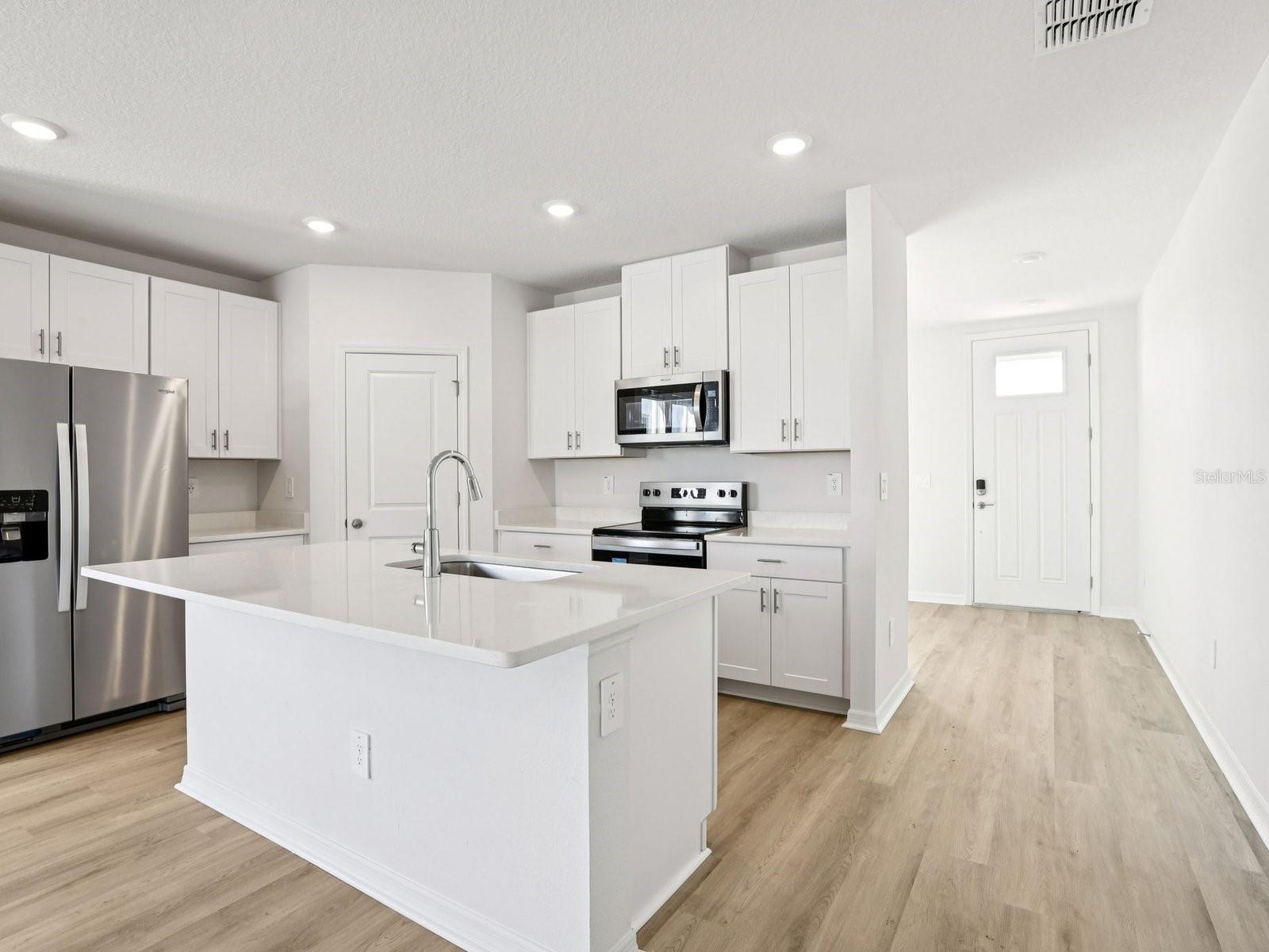 Interior photos are not of the actual home but are photos of the builder home with same floorplan with similar interior finishes and features.