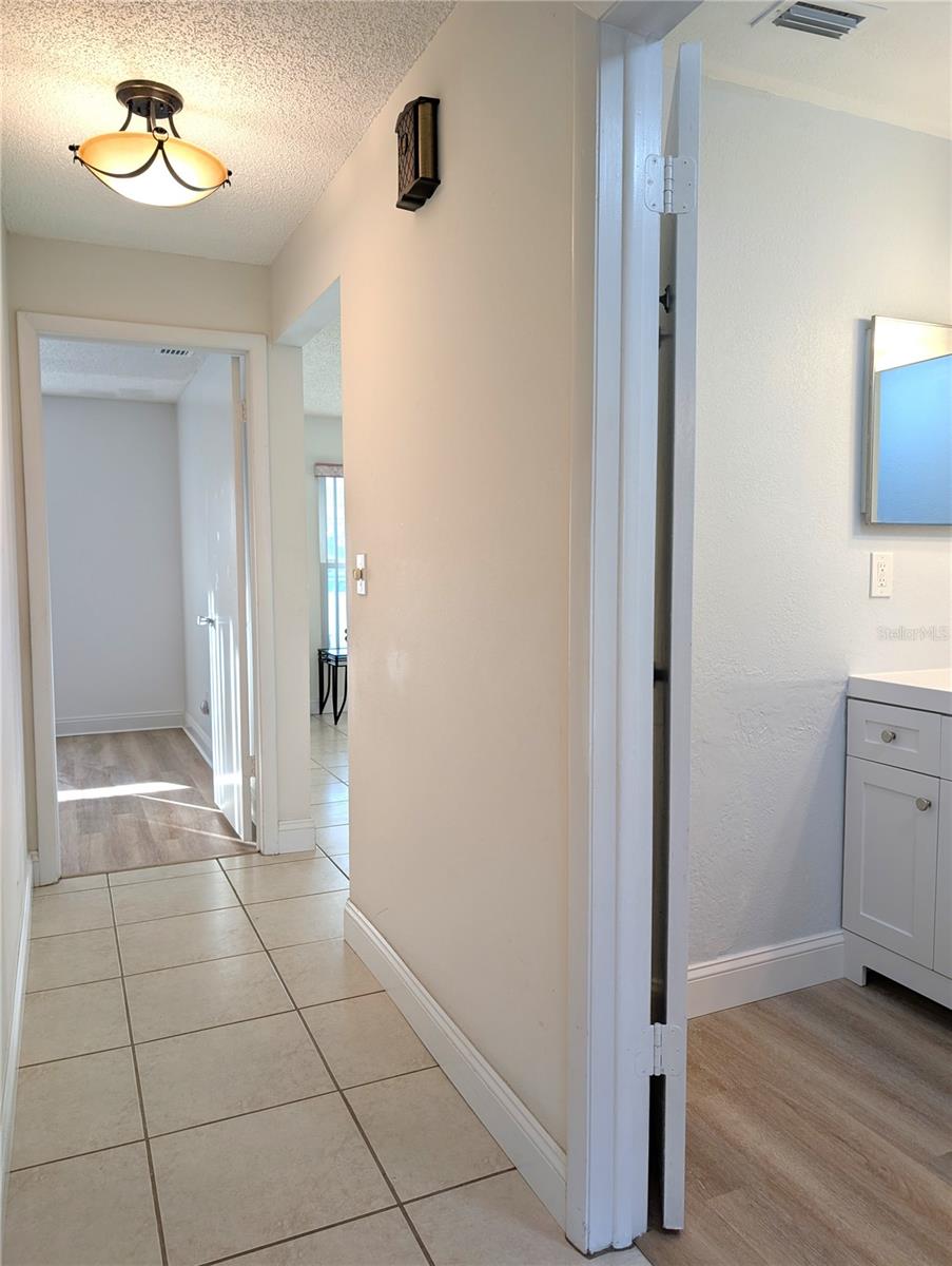 Bedroom Hallway with Guest Bathroom on right and Guest Bedroom at end of hall