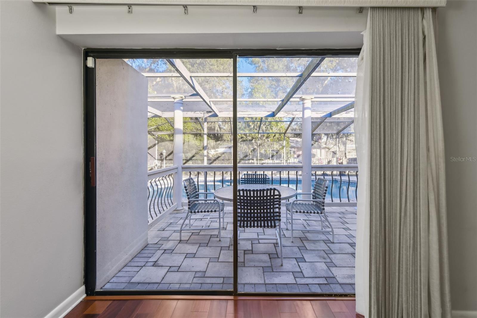 Sliding Glass Door  Entry From Primary Suite to Back Patio