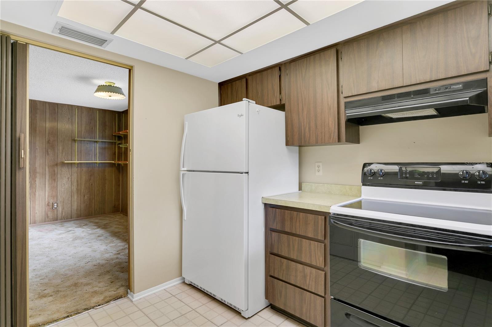 Separate family room adjacent to kitchen