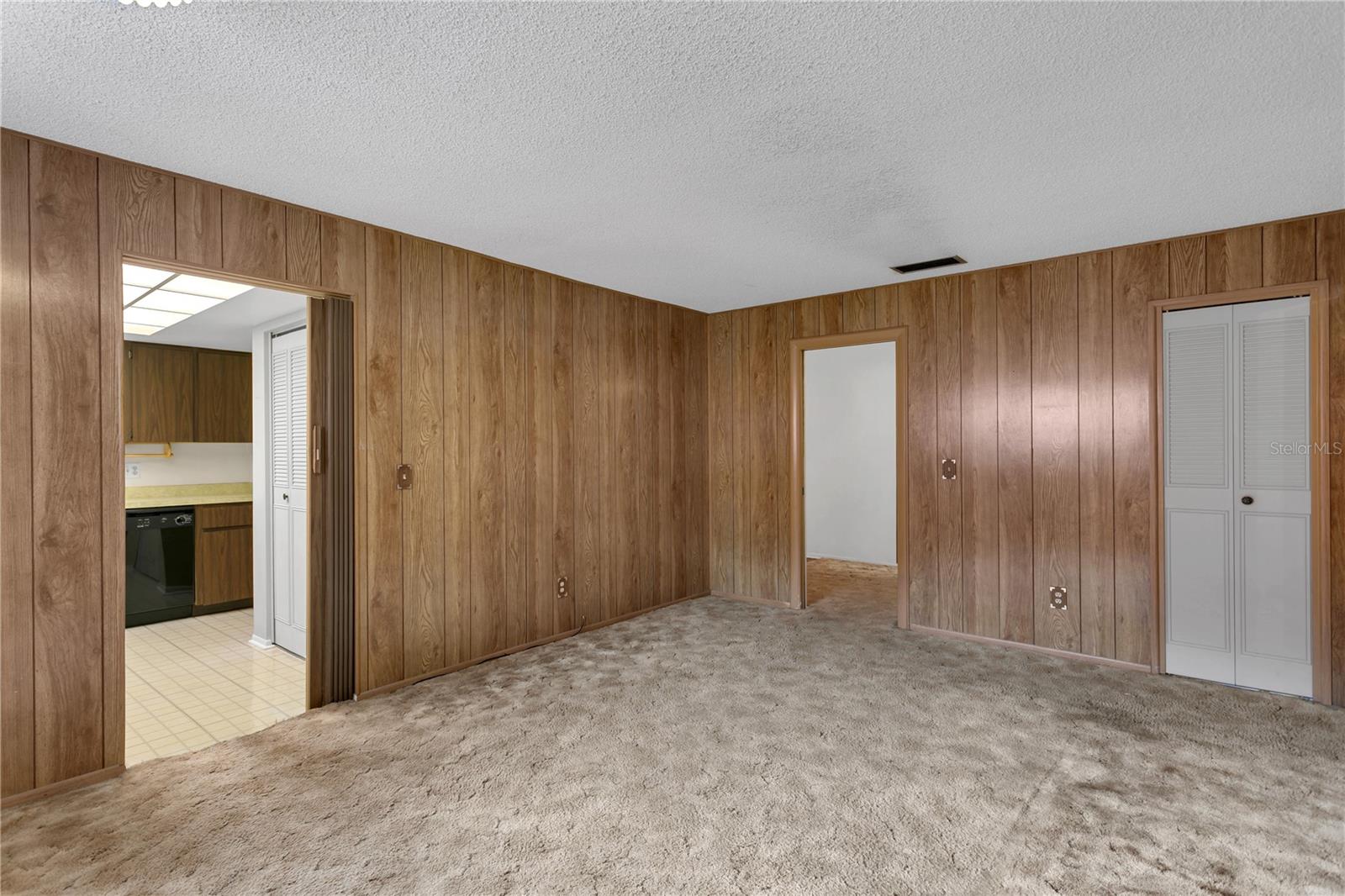 Large family room adjacent to kitchen