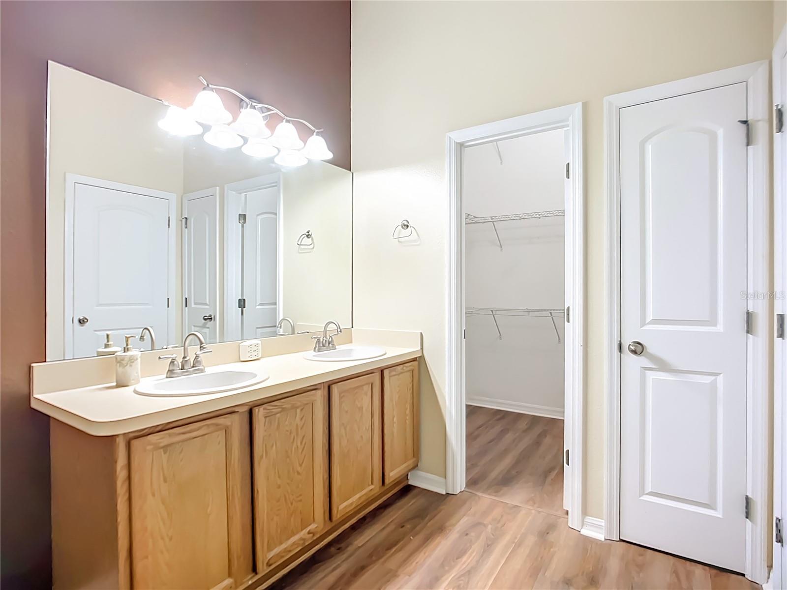 Primary bathroom with walk-in closet