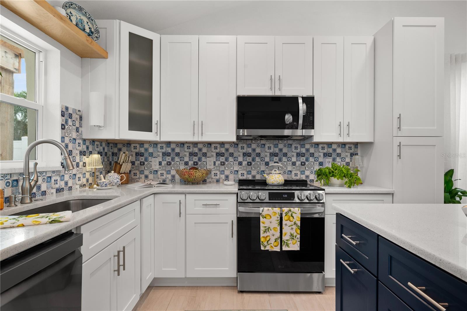 Kitchen with Quartz Counter tops.
