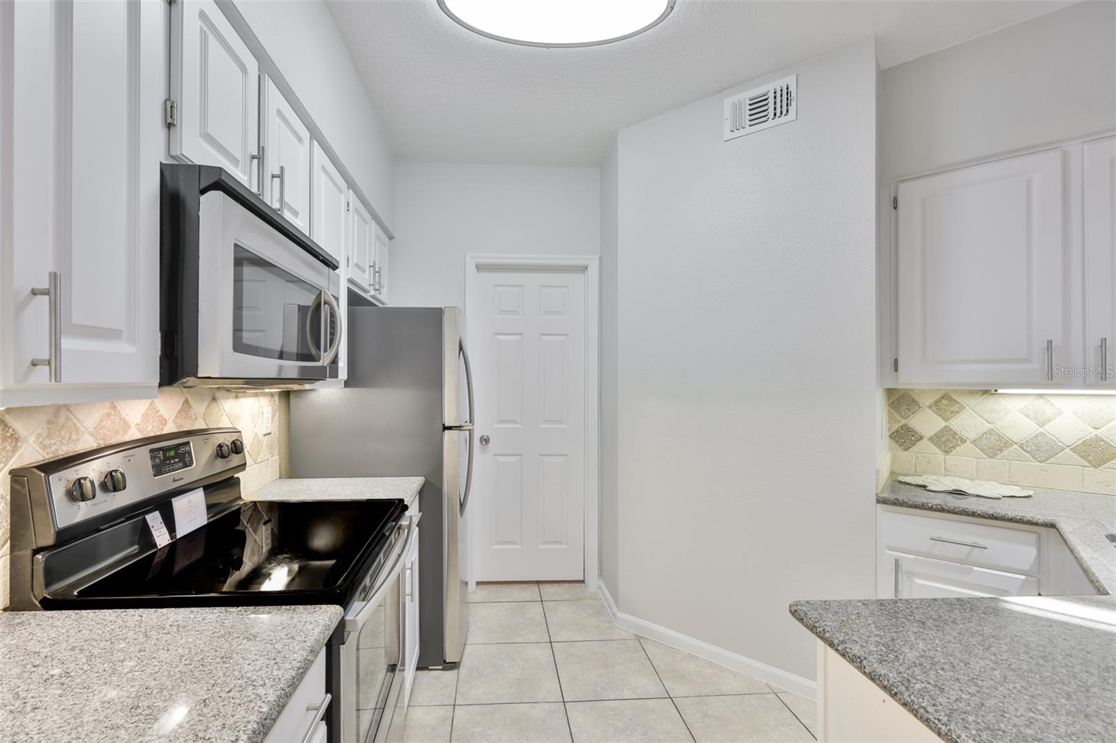 Kitchen into Laundry Room/Pantry/Storage