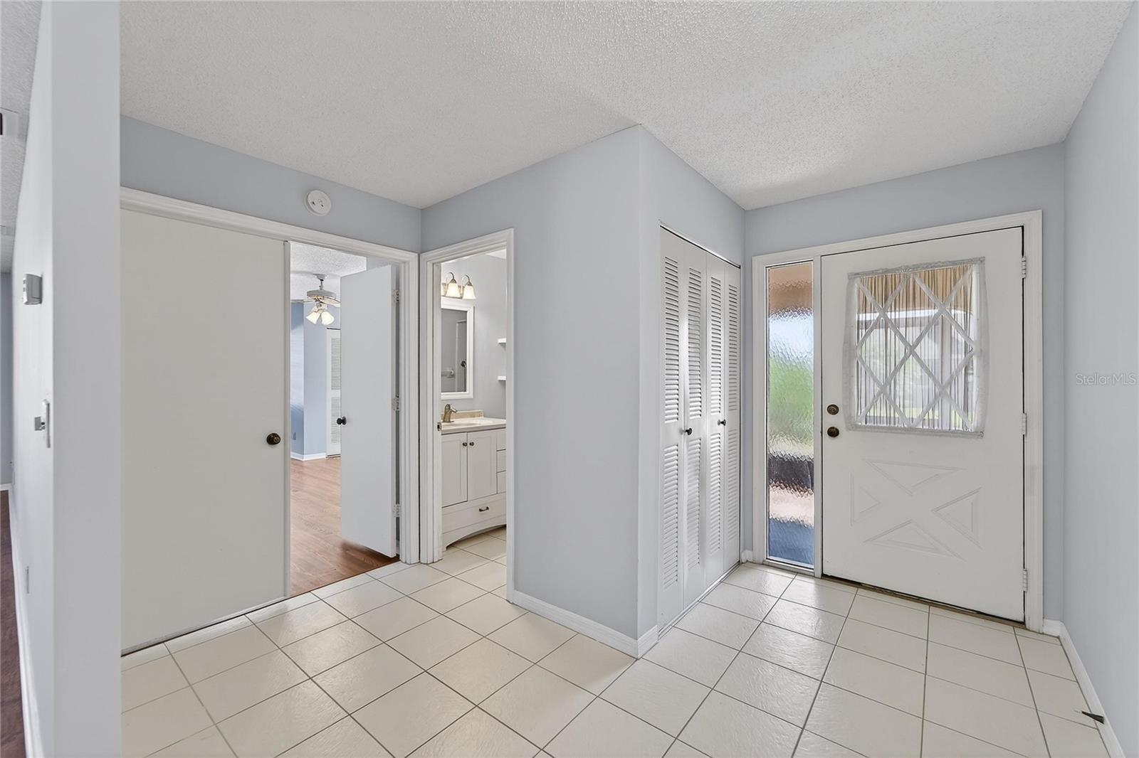 Front entry, hall bath and 2nd BR