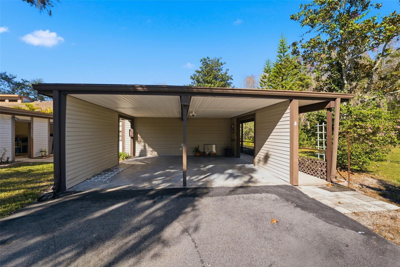 Convenient two-car carport with protected, easy-access parking.