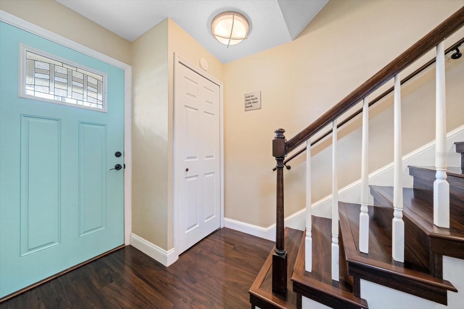 The entryway features a convenient coat room.