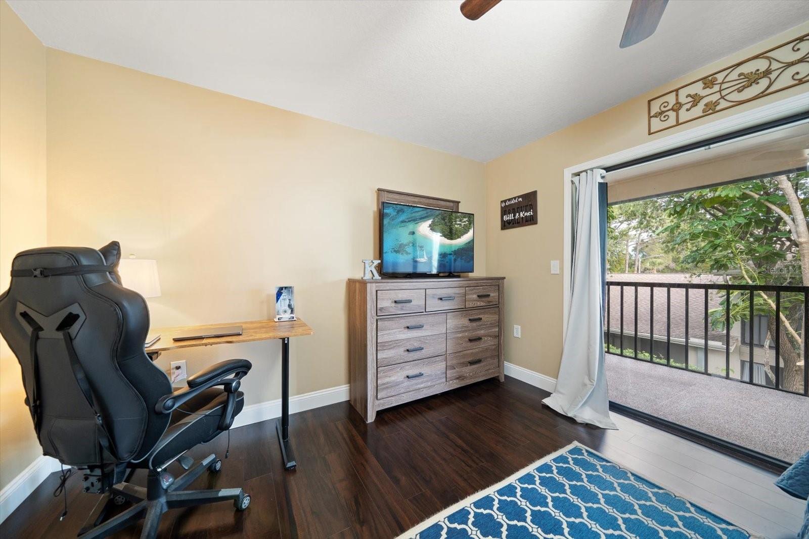 The primary bedroom offers plenty of space for all your furniture and desk if needed.