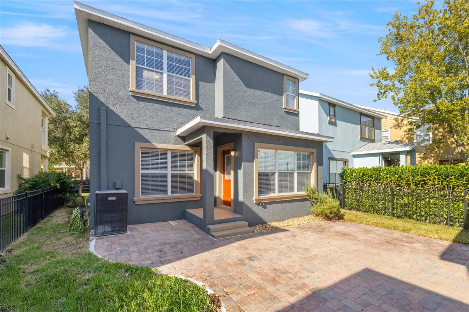 Paved patio between home and ADU