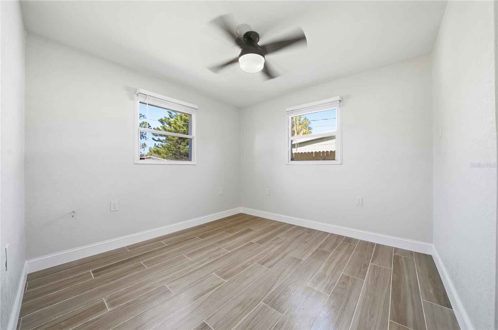 Second Bedroom on the right- facing the large backyard