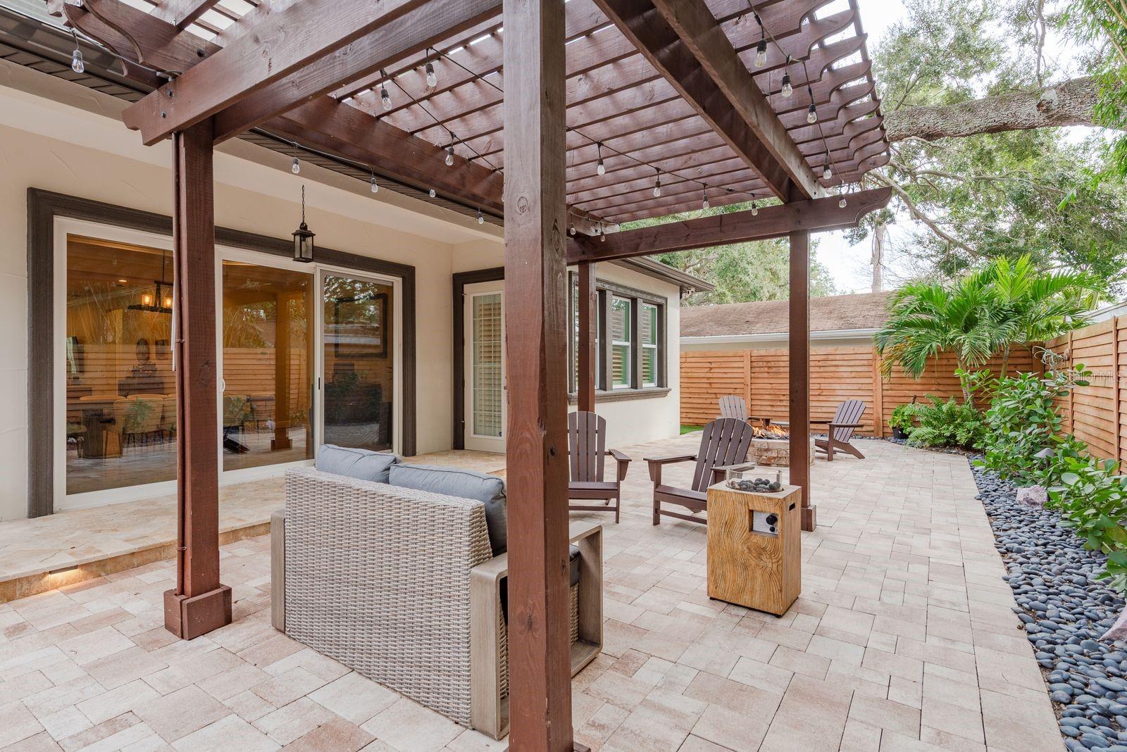 Custom Pergola with natural gas firepit