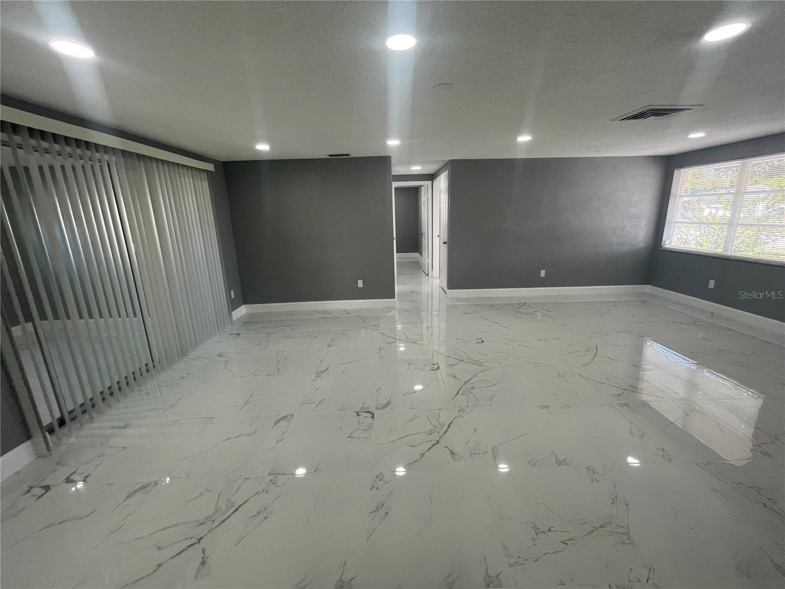 VIEW FROM KITCHEN TO DINNING, LIVING ROOMS