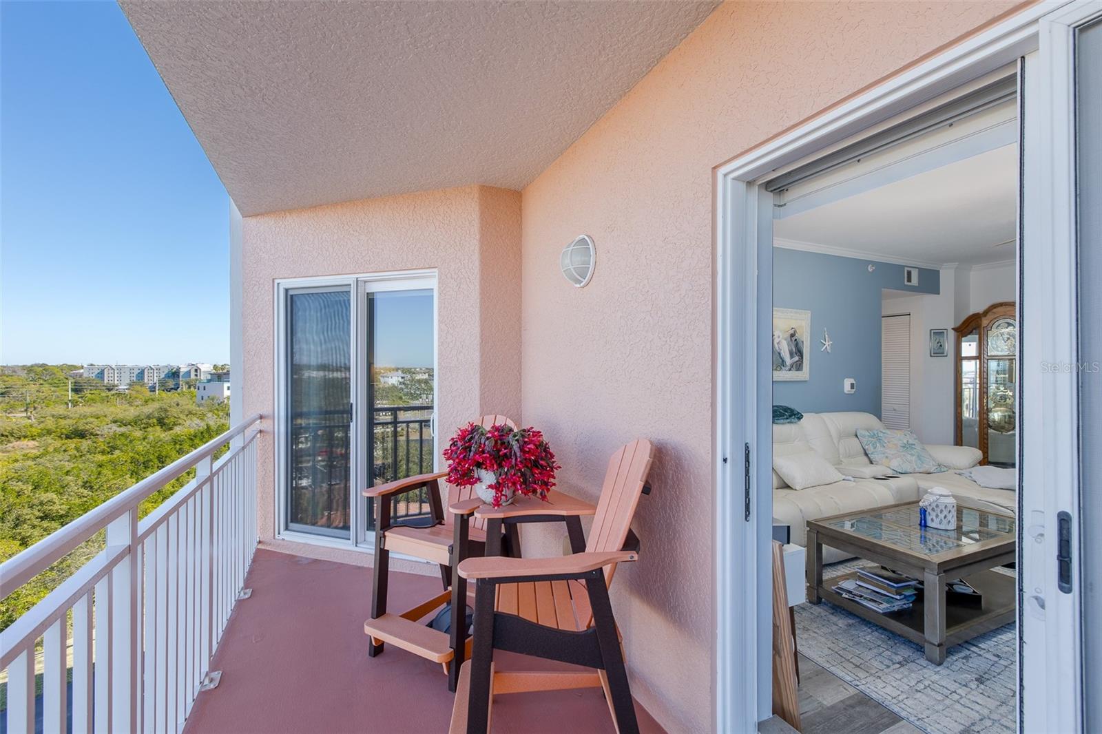 Balcony access from living room and primary bedroom