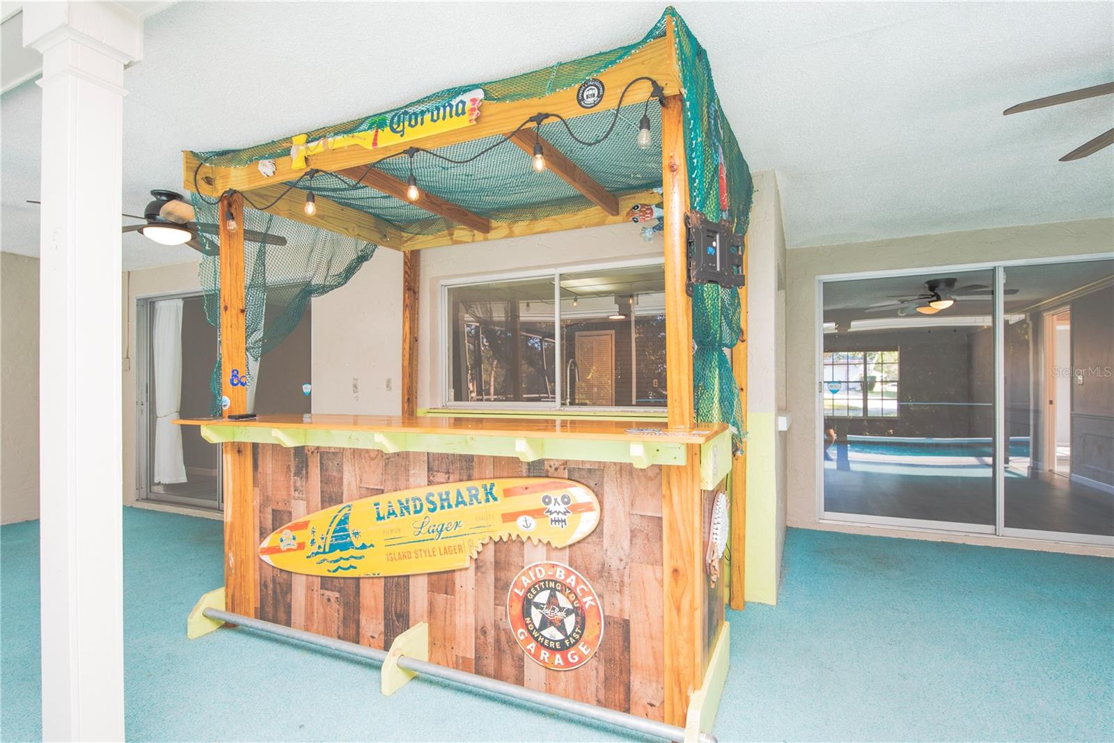 Tiki bar and covered lanai.