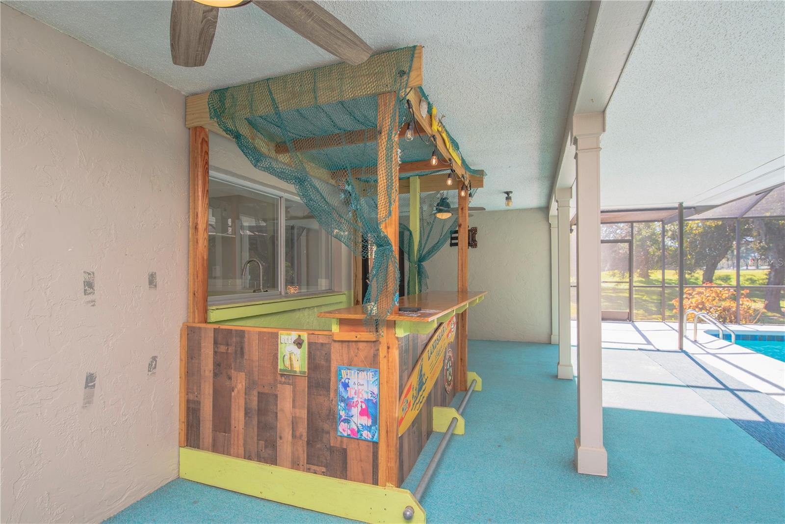 Tiki bar and covered lanai.