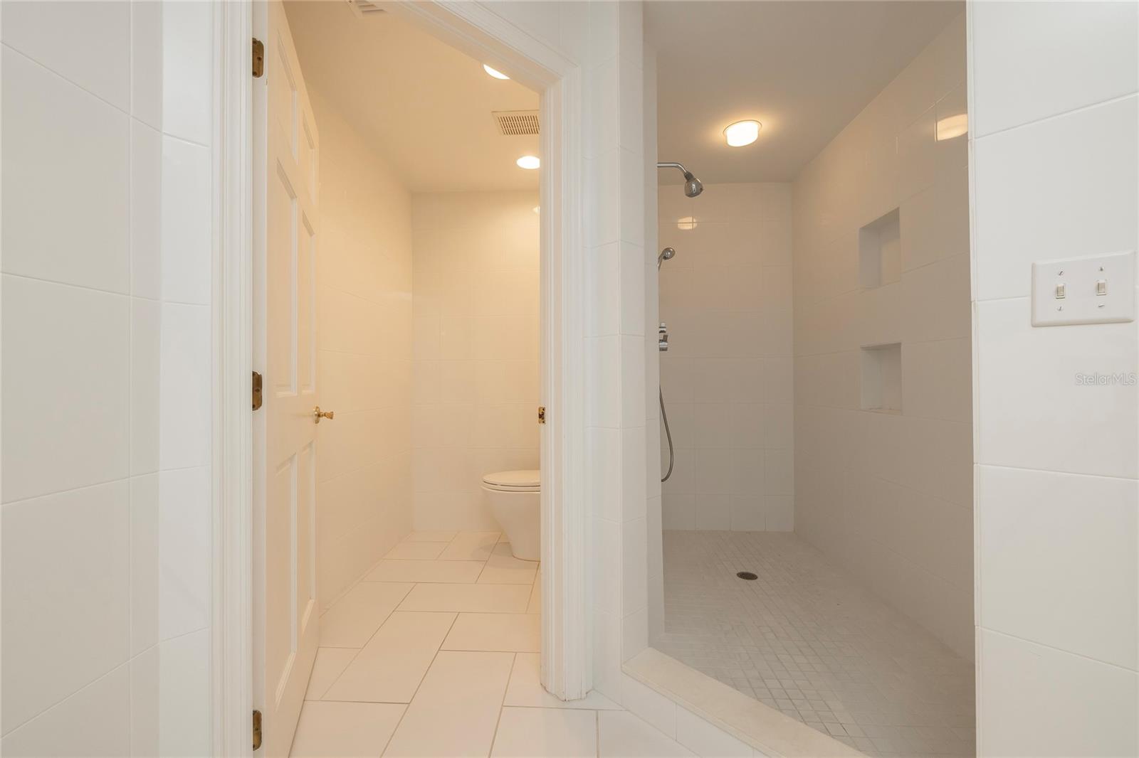 Master Bathroom with soaking tub, separate shower, dual vanities and separate water closet