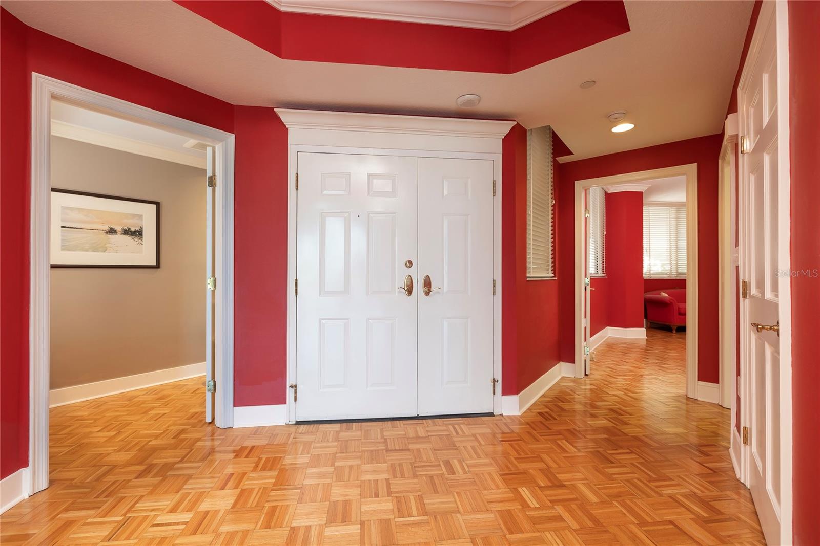 Foyer, Powder Room to the left and Second Bedroom to the right