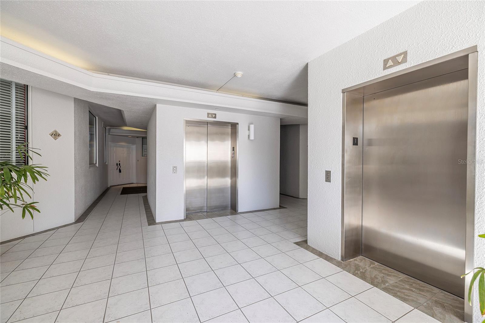 Elevators, unit 103 on left