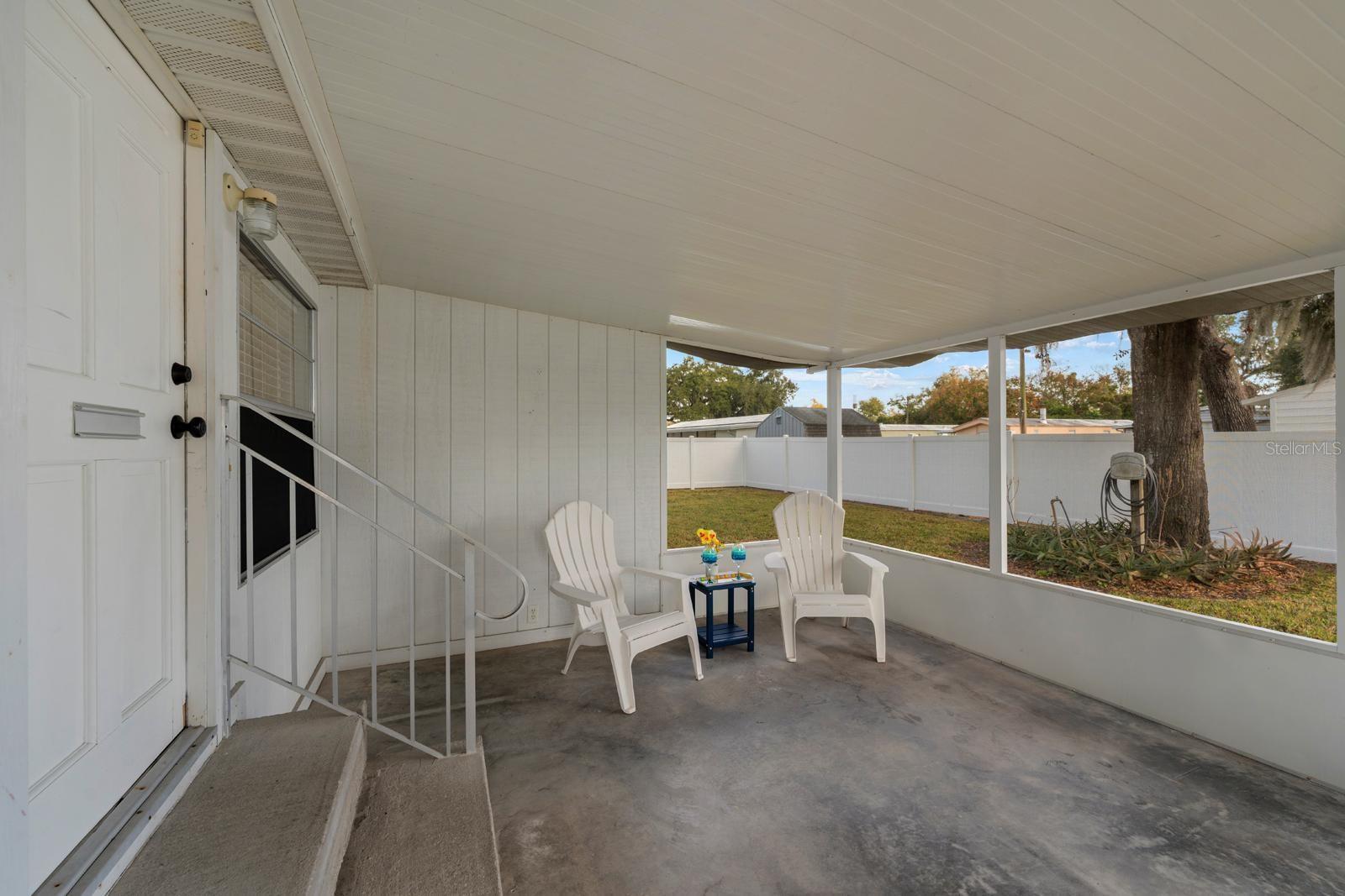 There's a screened-in porch out back with a long-lasting, metal roof and kick plate siding.