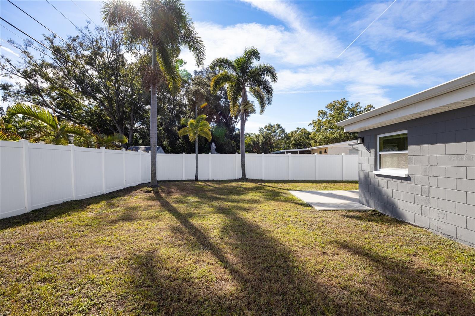Private back yard with vinyl fence