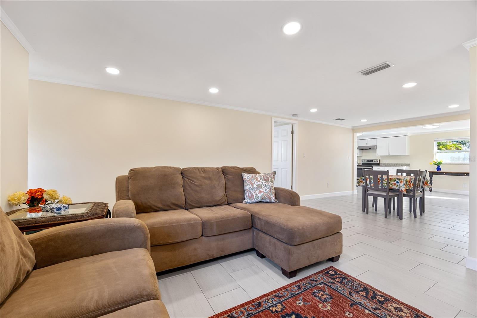 Living Room looking into dining room and kitchen
