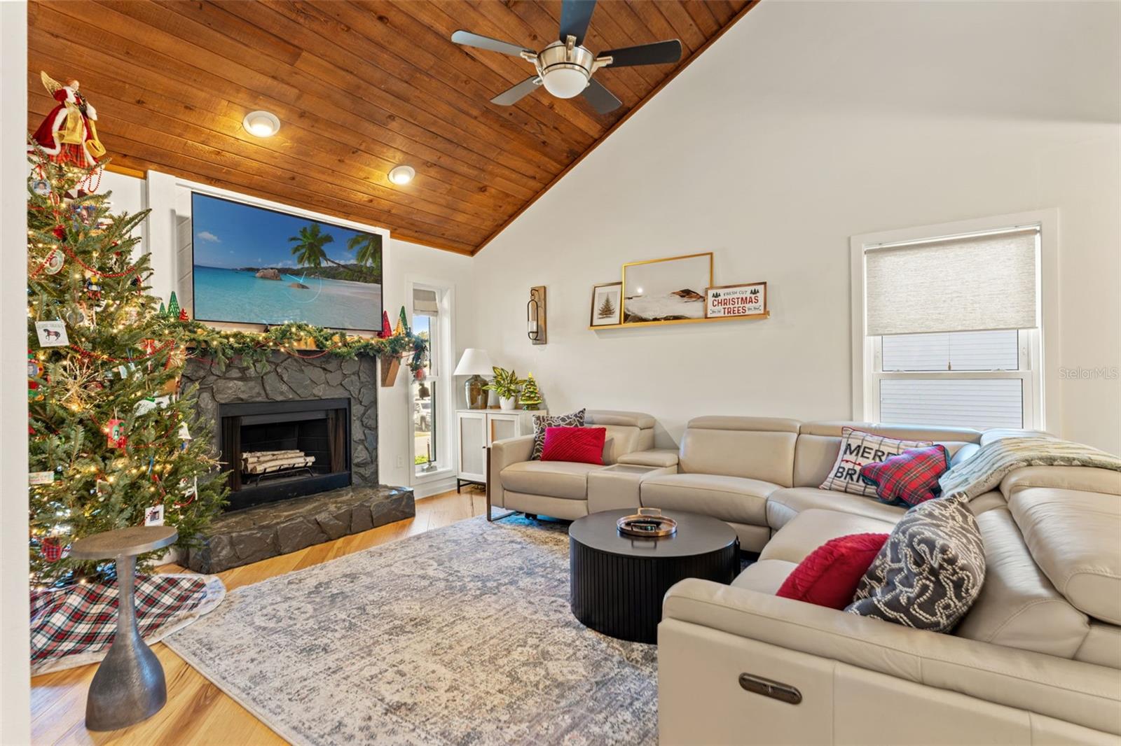 Spacious living area with excellent wall space, high ceilings, and flexible furniture layout options.