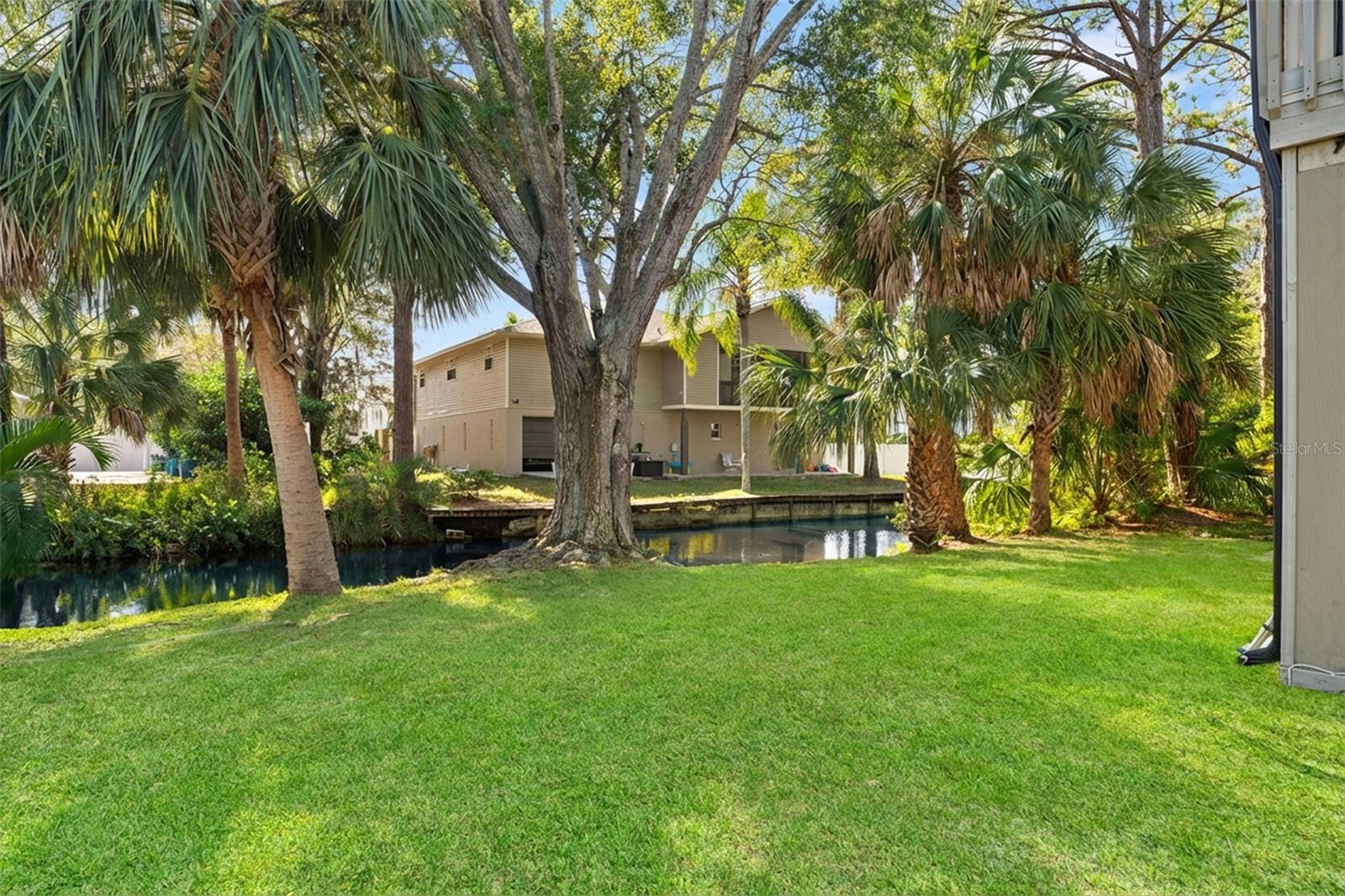 The property backs to a peaceful canal, enhancing privacy and offering a tranquil Florida lifestyle setting.