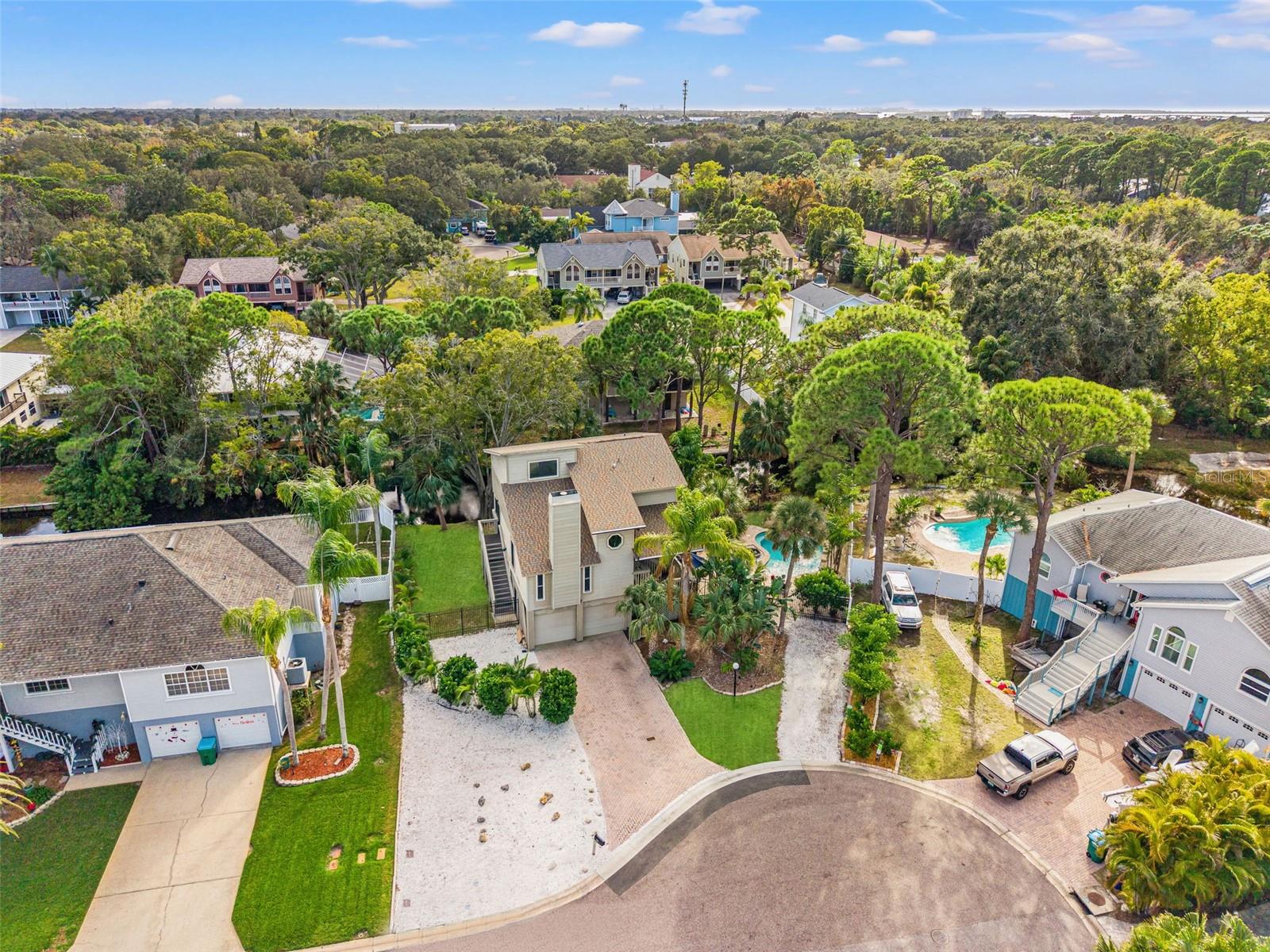 Positioned on a private cul-de-sac with generous driveway space and a landscaped approach.