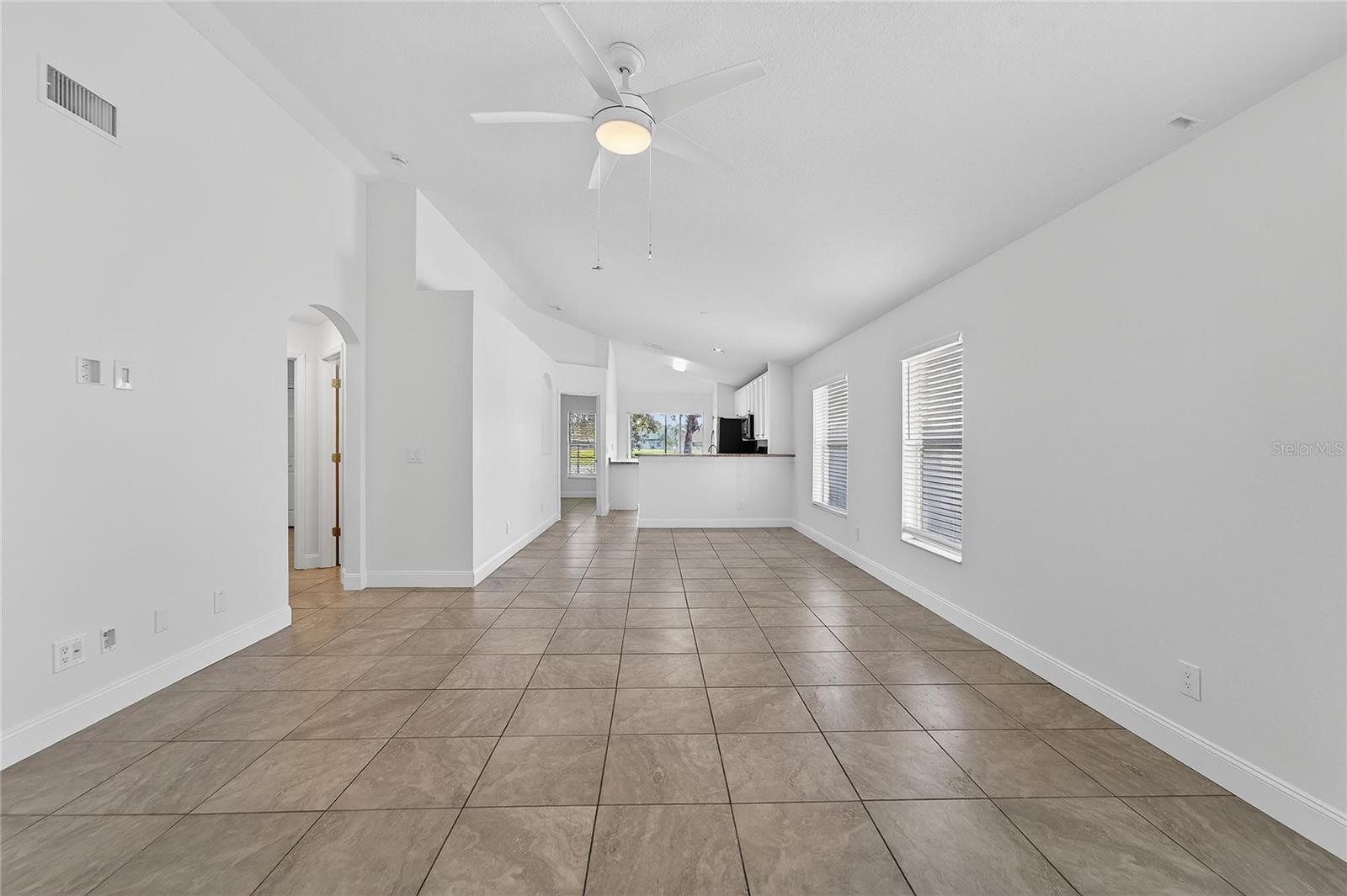 formal living/dining room and kitchen