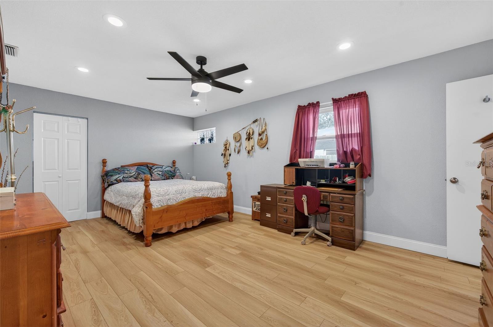 Primary bedroom with walk in closet and ensuite.
