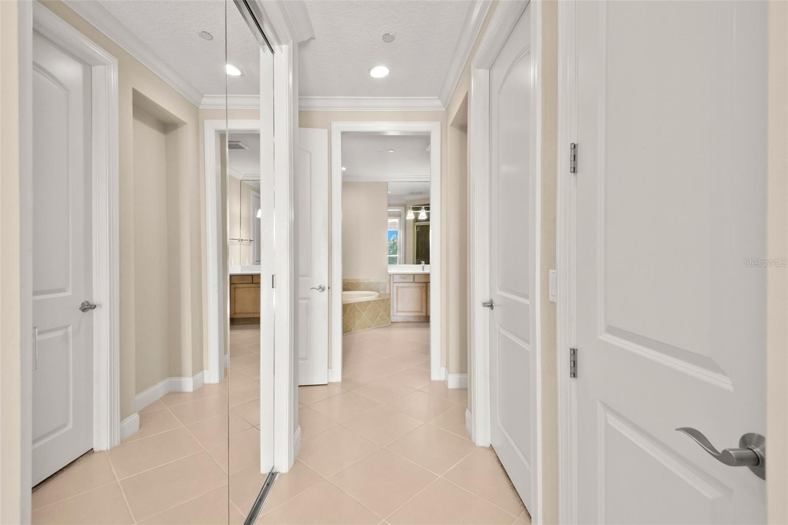 Walking from Main Bedroom to Owner's Bath.