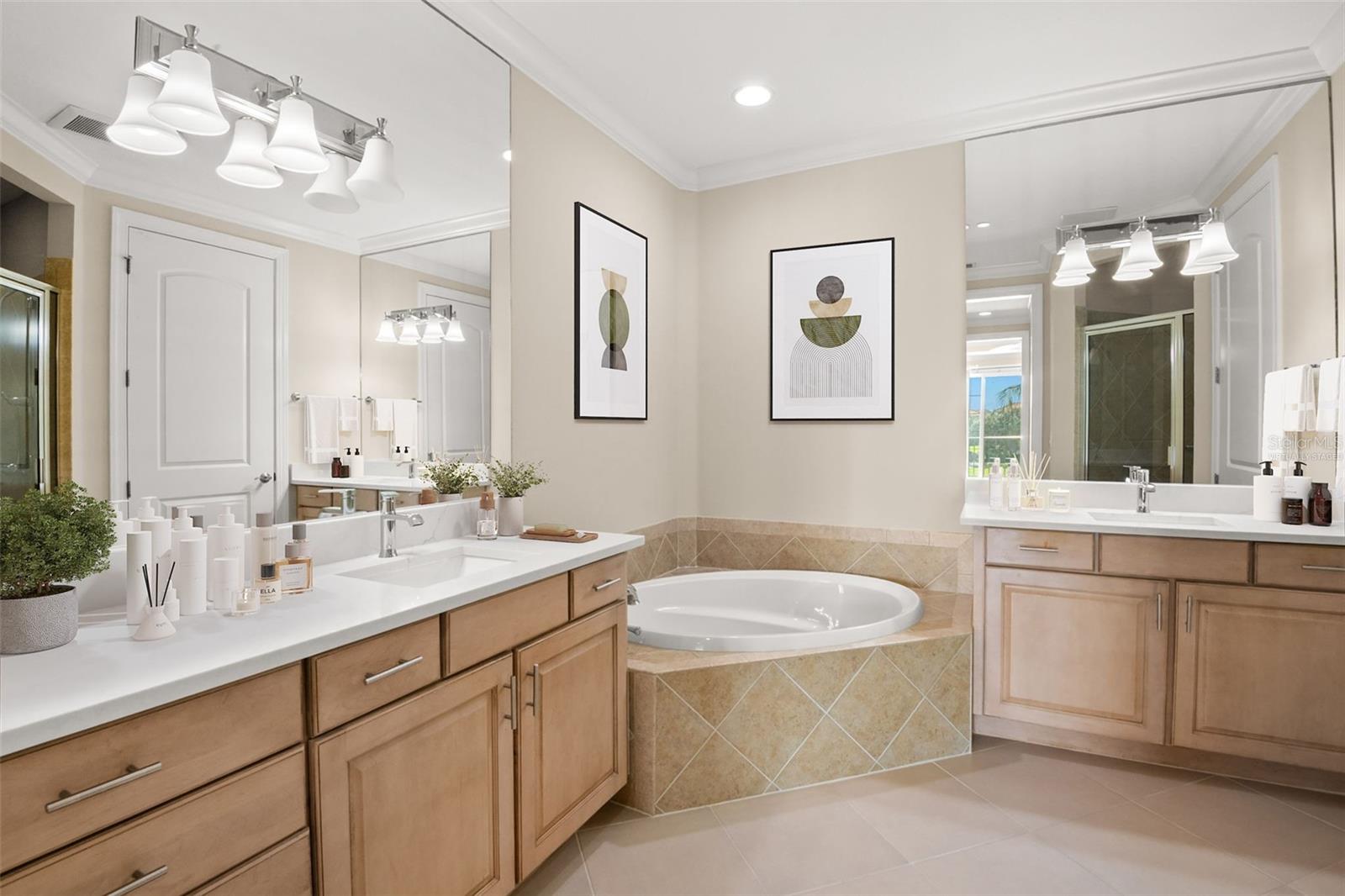 Virtually staged; Oversized, dual vanities, and large tub in Owner's Bath.