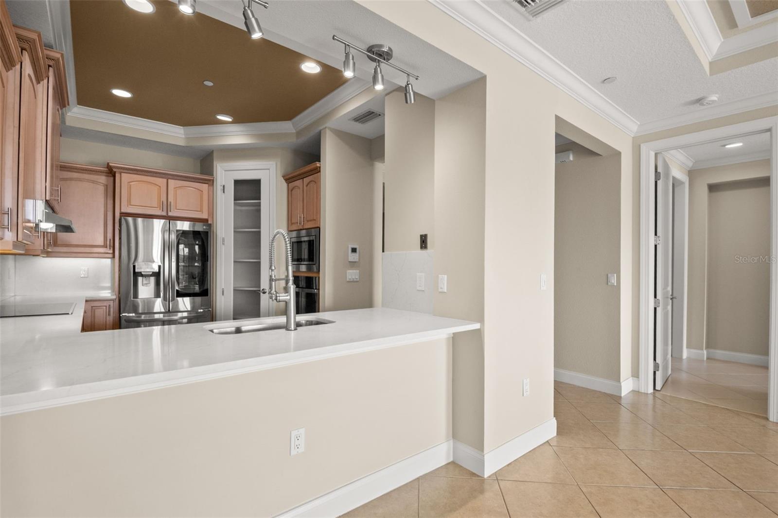 Looking into Kitchen from Dining Room area.