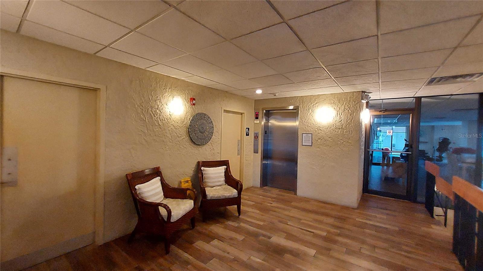 Upper level foyer with restrooms