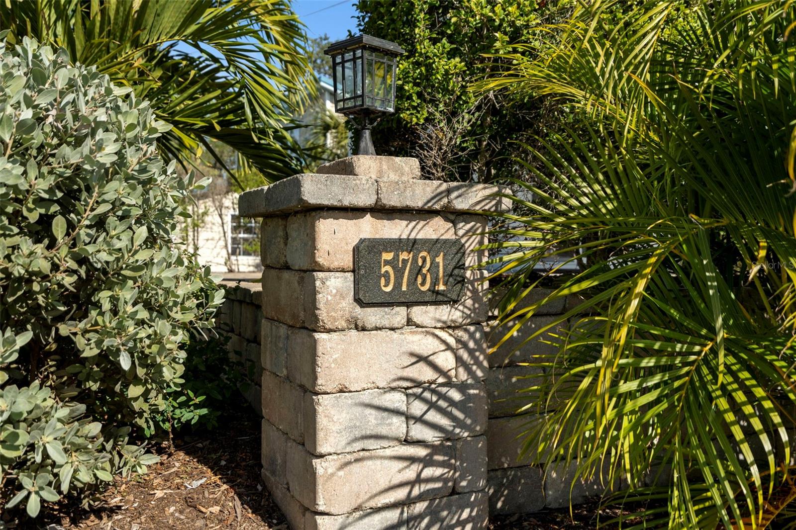 The landscaping has been carefully curated with an eye for detail.