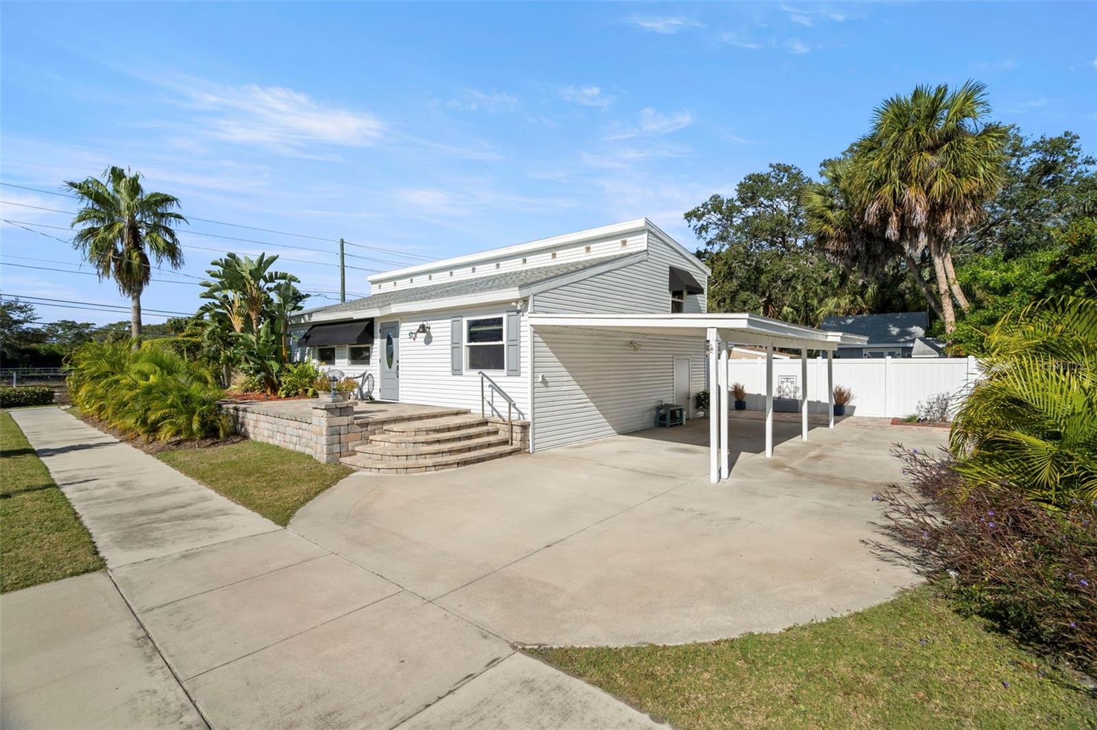 There is ample parking to accommodate both vehicles and golfcarts.