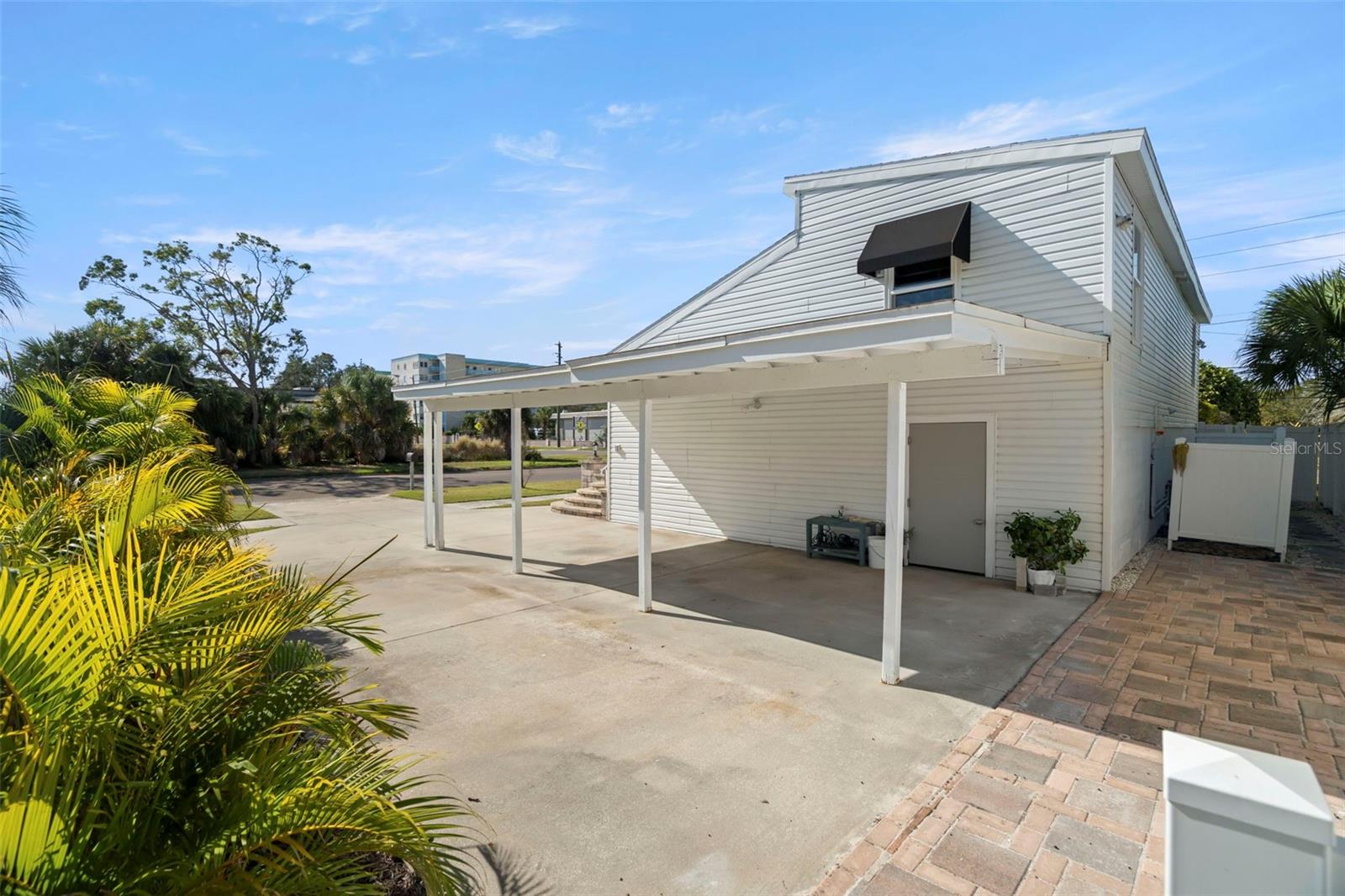 There is ample parking to accommodate both vehicles and golfcarts.