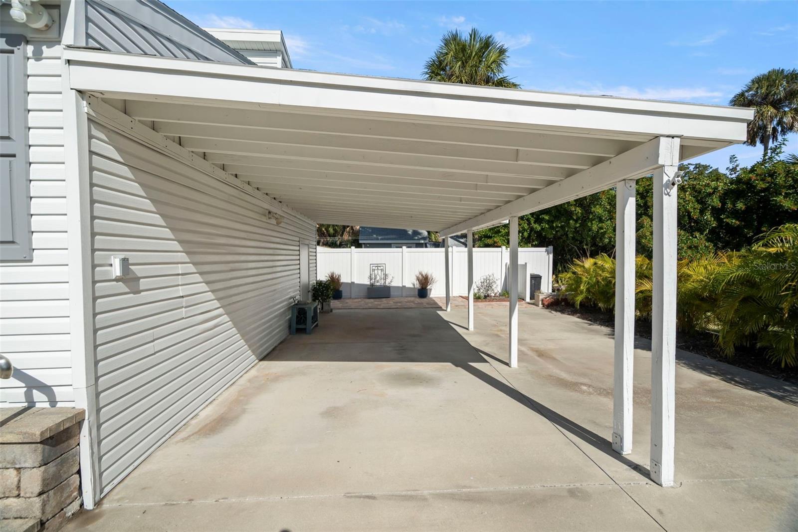 There is ample parking to accommodate both vehicles and golfcarts.