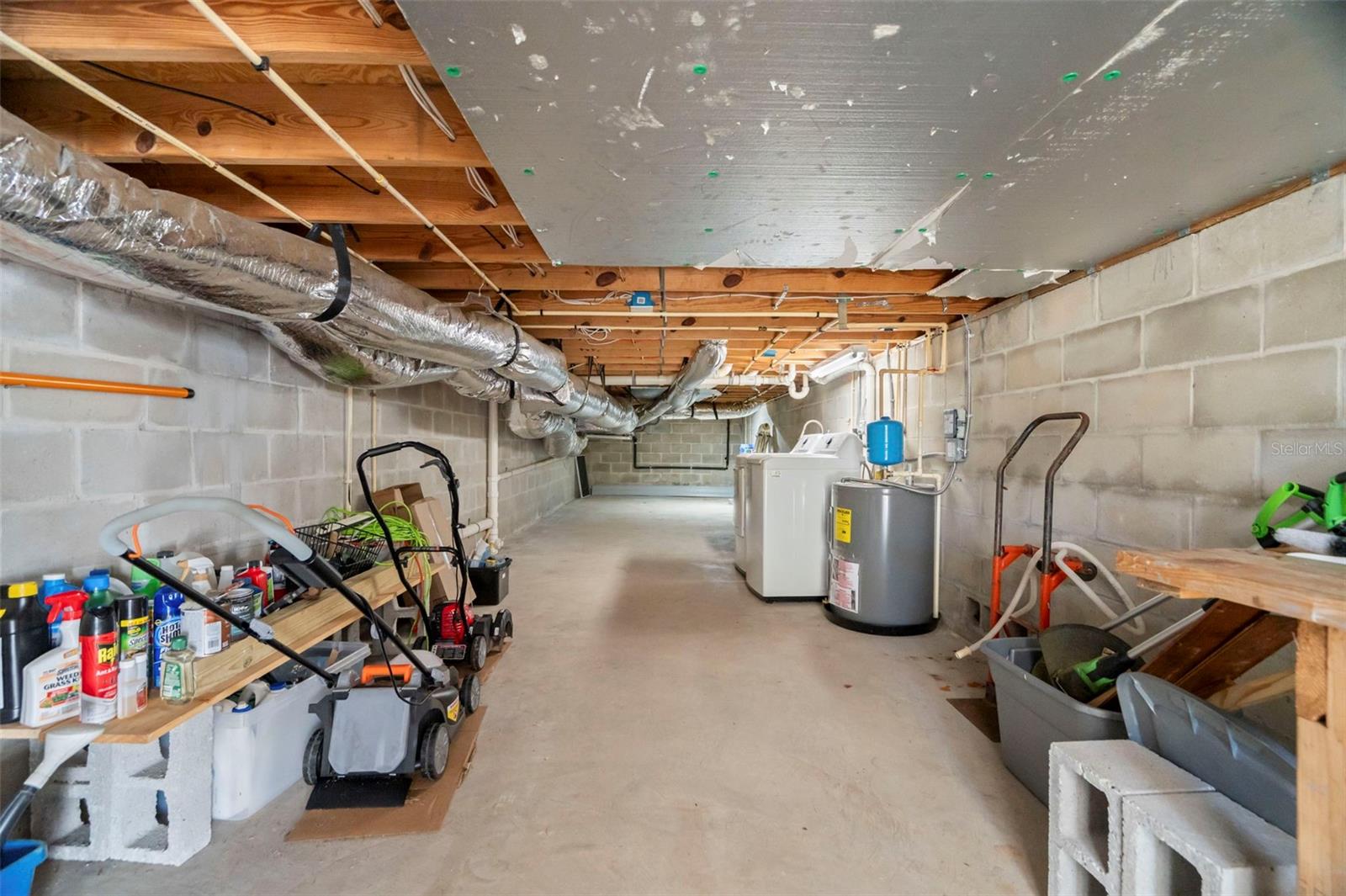 An incredibly unique feature is the additional 500+ square feet of storage and utility space found at the end of the carport.