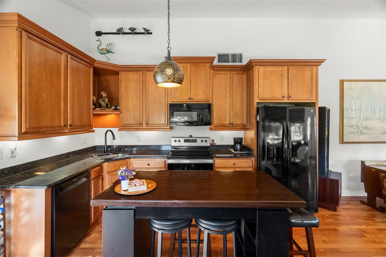 A generous island and breakfast bar.