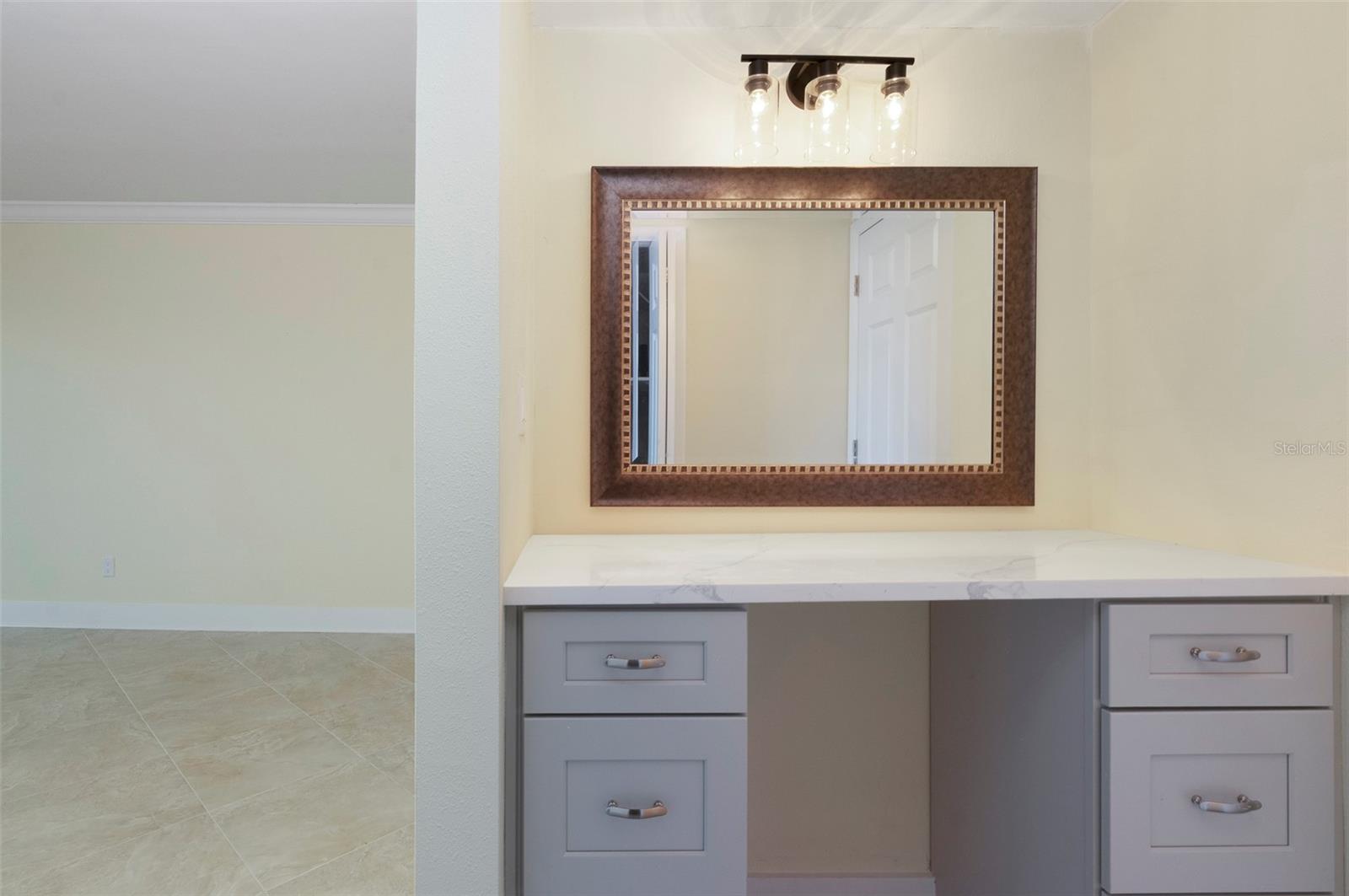Vanity area with new cabinets and Quartz counters.