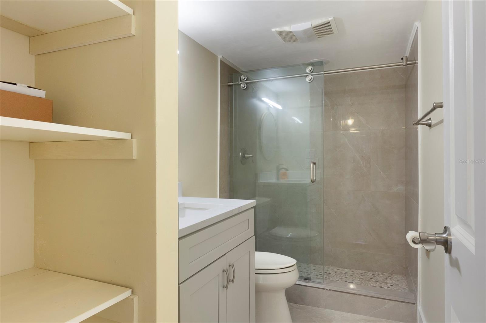 Guest Bathroom includes  walk-in shower.