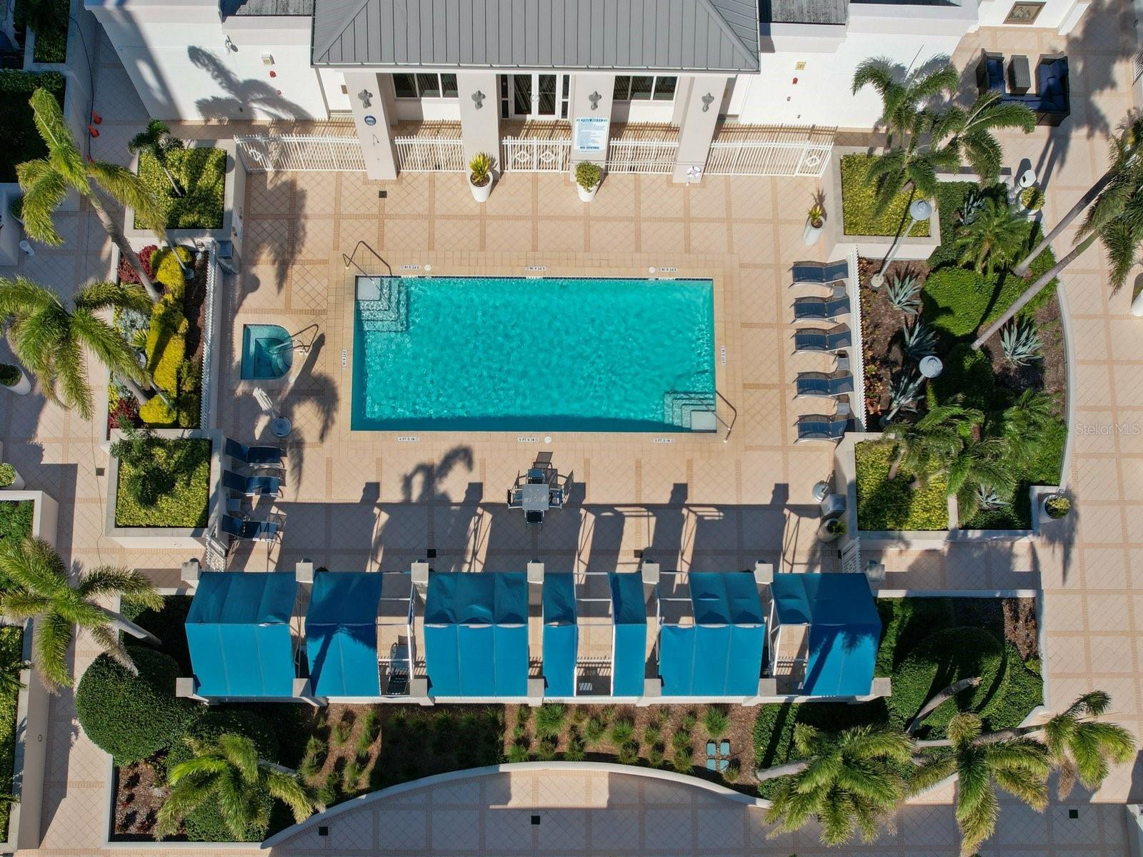 Heated pool with cabanas