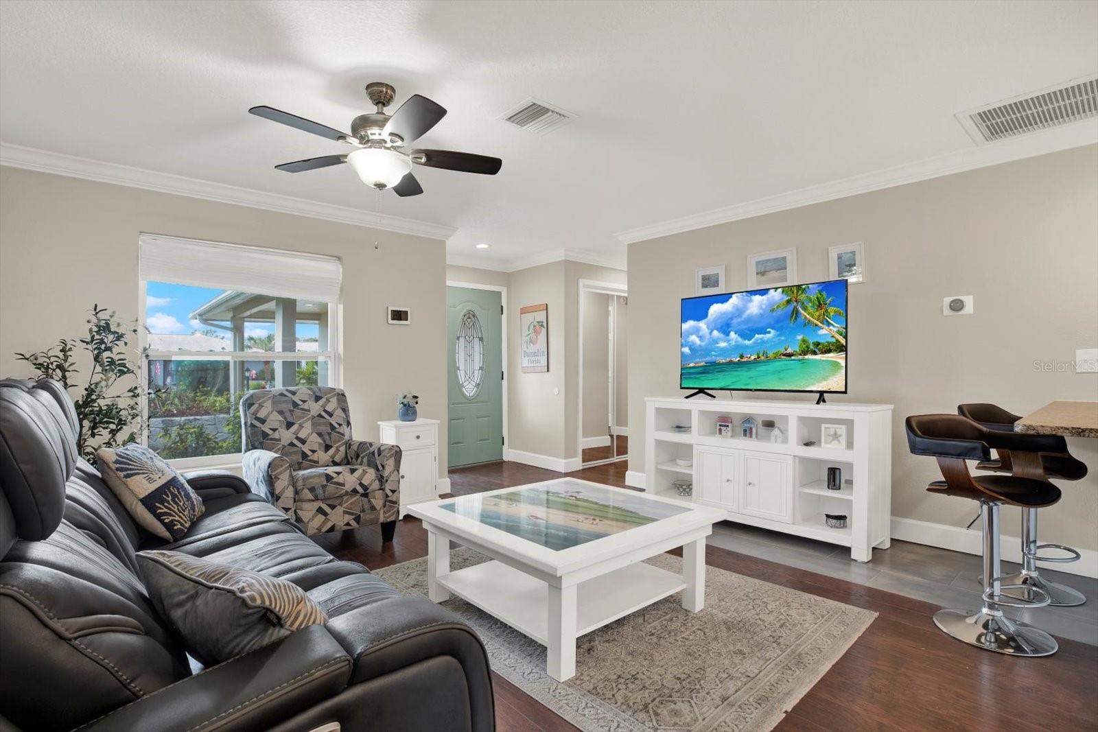 The large living room window allows for great natural light