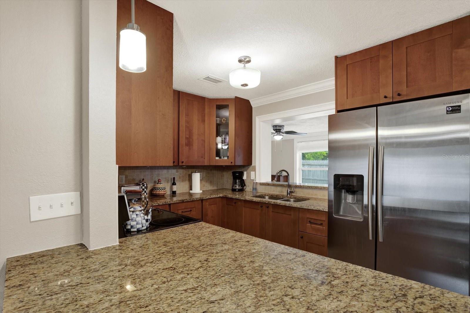 A large bar offers ideal counterspace and additional seating