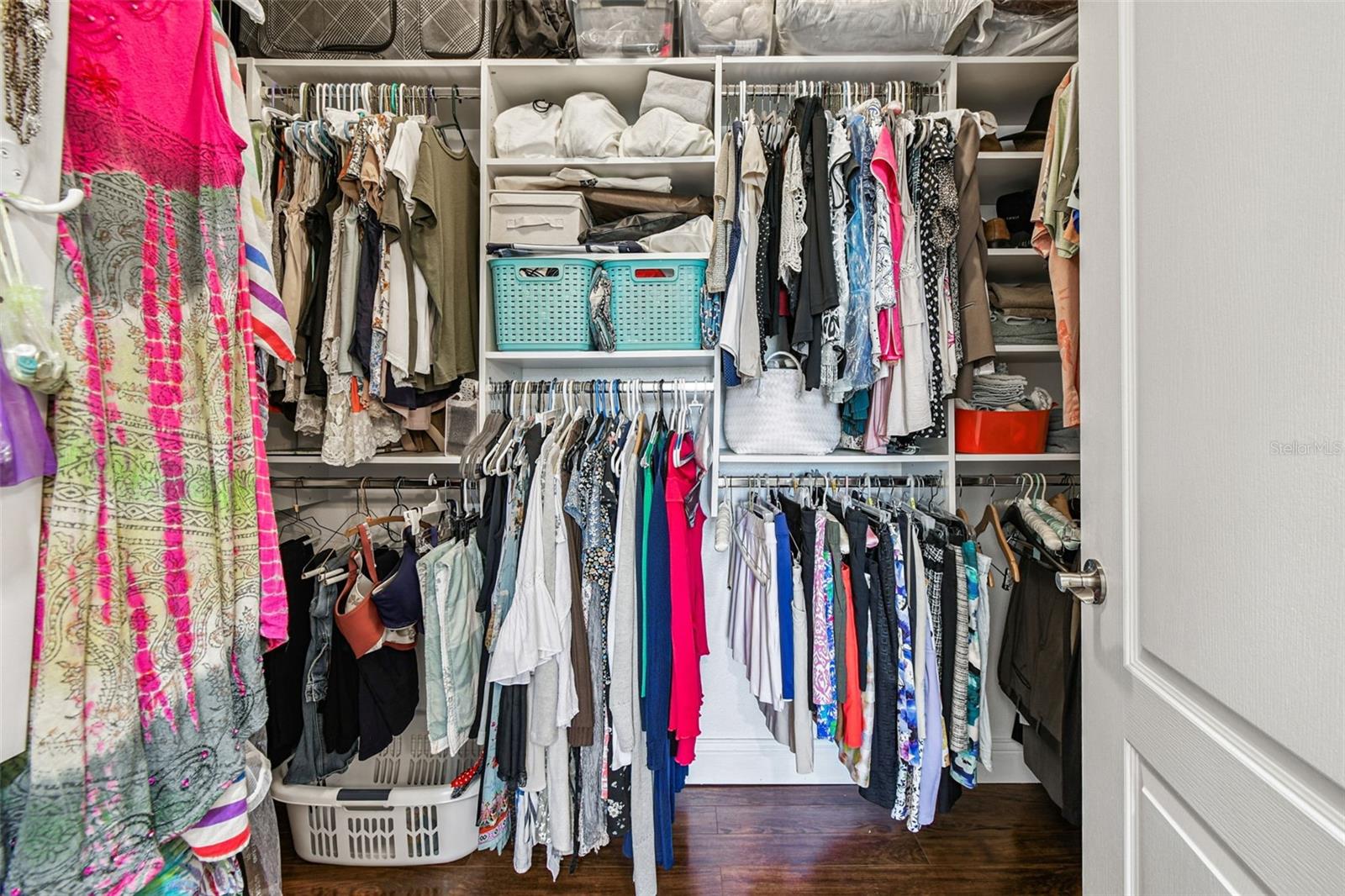Primary walk-in closet with organzers